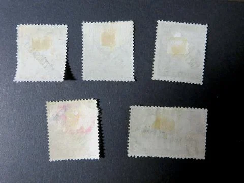 Exploring the Reverse Side of Vintage 20th-Century Postage Stamps in a Phil.. Stock Photos