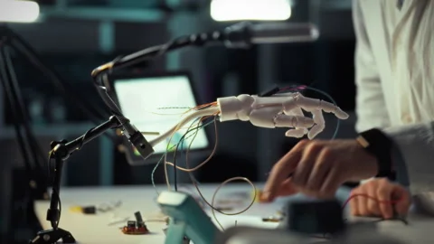 Exploring robotics with a focus on hand engineering in a modern workspace Stock Footage 331351018