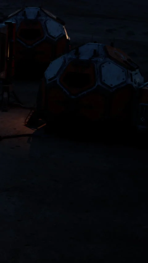 Exploring a robotics unit with orange details at night in a test area Stock Footage 339037785