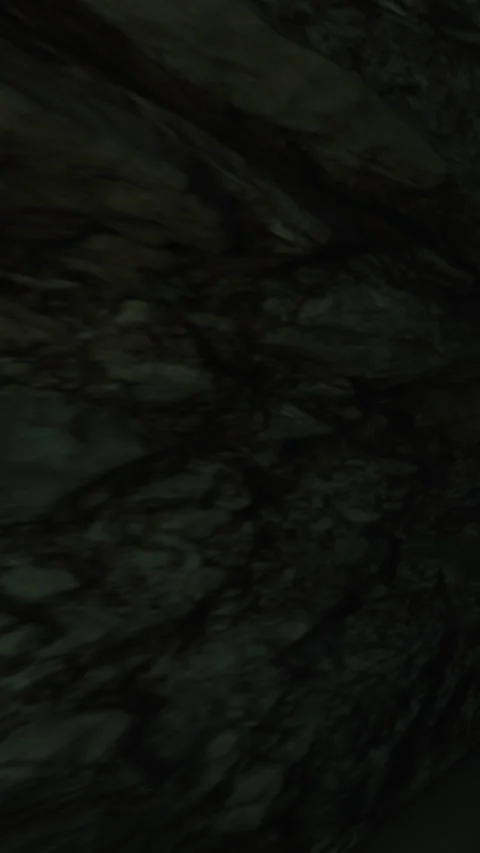 Exploring a rock formation in a cave during a daytime adventure Stock Footage 339949375