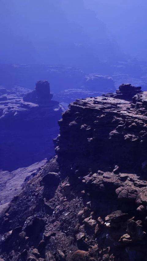 Exploring rocky landscape at dusk in a distant mountain range location Vídeo Stock 342444420