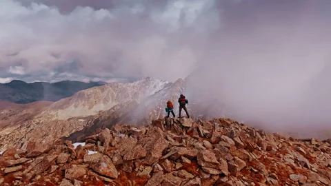 Exploring the rocky summit in the Pyrenees Mountains of Spain Stock Footage 303625136
