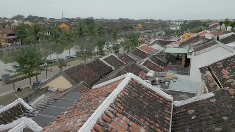 Exploring rooftops and river views in Hoian, Vietnam on a cloudy day Stock Footage 308887509