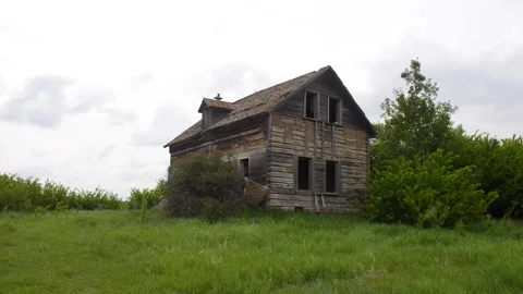 Exploring the ruins of an derelict abandoned rural farmhouse in an Video stock 166994937