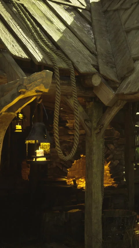 Exploring a rustic wooden structure with warm light and tangled ropes Stock Footage 341416882