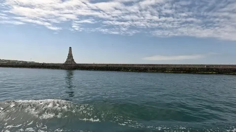 Exploring the sea horizons: a view of the pier from the ferry deck Stock Footage 274633282