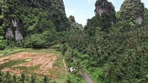 Exploring the serene beauty of Thailand's cliffs, rivers, and lush landscapes Stock Footage 310558774