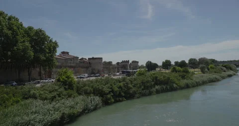 Exploring the serene riverside landscape in the heart of an ancient city during 库存影片 314075766