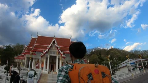 Exploring a Serene Temple Against a Vibrant Sky Stock Footage 319415211
