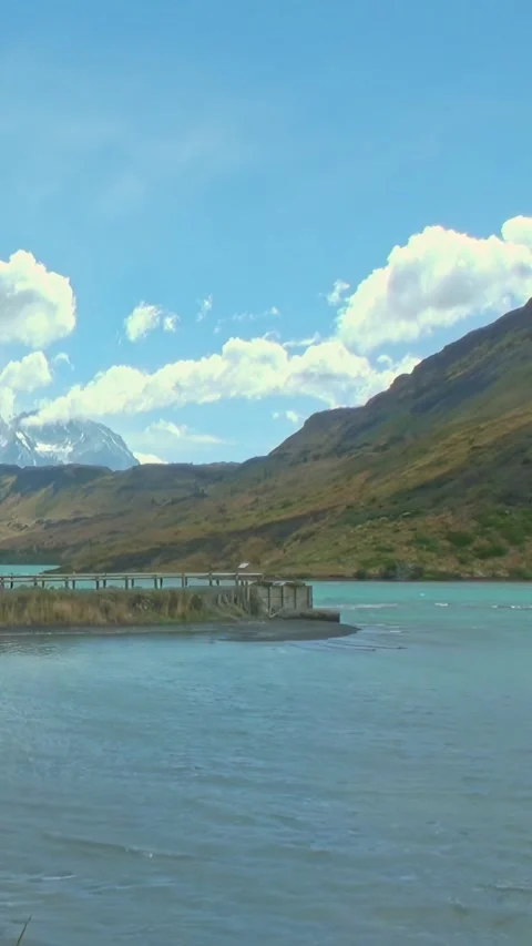 Exploring serene waters and mountains in Los Alerces National Park 스톡 동영상 309460135