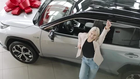Exploring a sleek car showroom with elegant vehicles and stunning designs Stock Footage 312665394