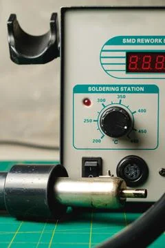 Exploring a soldering station for electronic repairs and innovations Stock Photos
