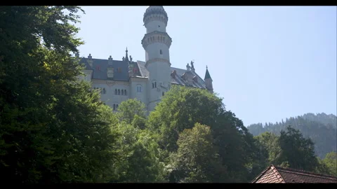 Exploring the stunning architecture of a historical castle surrounded by lush 스톡 동영상 283794703