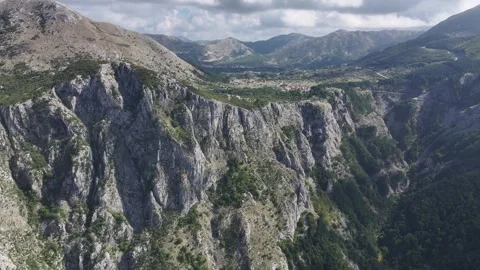 Exploring the stunning cliffs and lush landscapes above Kotor, showcasing Stock Footage 287756996