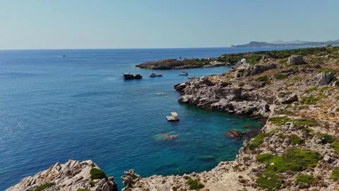 Exploring the stunning coastlines and blue waters of Rhodes, Greece Stock Footage 318027733