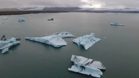Exploring stunning icebergs in a serene Arctic landscape Video stock 320293349