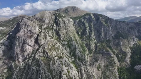 Exploring the stunning mountains above Kotor with breathtaking views and Stock Footage 287757082