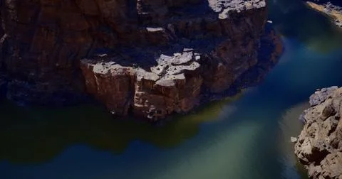 Exploring the stunning rock formations and clear waters of a canyon Stock Illustration