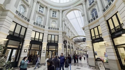 Exploring a stunning shopping arcade the passage during the day Stock Footage 301779586