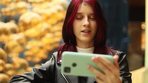 Exploring stylish trends while connecting with friends at the mall Stock-Footage 295268980