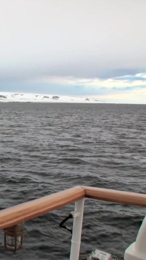 Exploring the Sublime Arctic Expanse From a Ship's Tranquil Deck Stock Footage 340485589