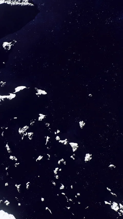 Exploring the surface of a comet with rocky textures and dark space background Stock Footage 334310407