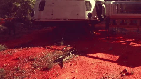 Exploring a Surreal Landscape With an Old Spacecraft on Red Earth Stock Footage 346688879