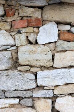 Exploring the textures of ancient stone walls in a historical setting fille.. Stock Photos