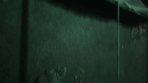 Exploring the Textures and Shadows of a Weathered Wall in Urban Space Stock Footage 344930039