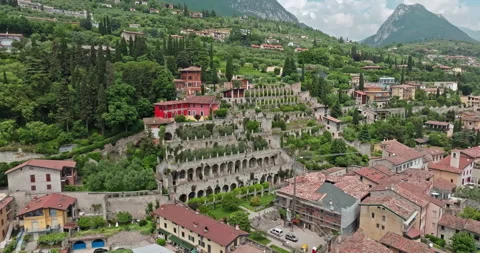 Exploring Toscolano Maderno's Architectural Charm: Aerial Journey Stock Footage 280465187