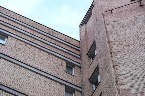 Exploring the unique architectural lines of a brick building Stock Photos