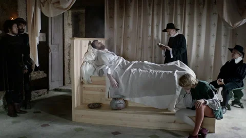 Exploring a unique art performance in a dark setting with actors engaged Stock Footage 327951046