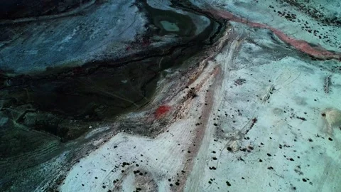 Exploring the unique landscape of colorful salt flats in nature Stock Footage 320262941