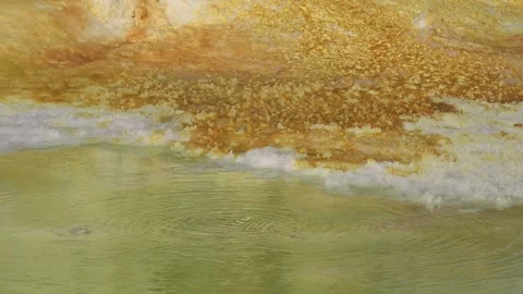 Exploring the unique landscape of Danakil Depression in Ethiopia at an acid lake Video stock 340388940