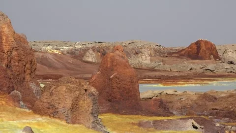 Exploring the unique landscape of Danakil Depression in Ethiopia at an acid lake Video stock 340388957