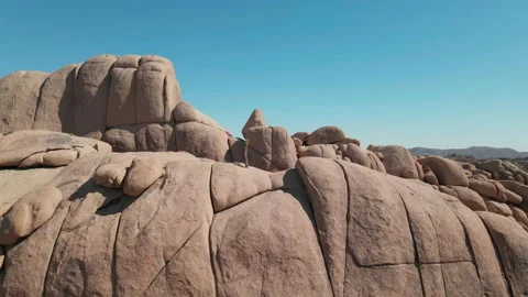 Exploring the unique rock formations of joshua tree national park desert Stock Footage 312674819
