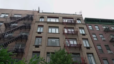 Exploring the Urban Landscape Featuring Classic Architecture in a Vibrant City Stock Footage 291024071