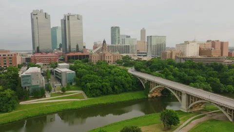 Exploring urban rooftops and greenery in a vibrant cityscape Stock Footage 288872375