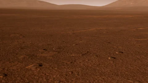 Exploring the Vast, Rocky Surface of a Distant Planet Under a Hazy Sky Stock Footage 344548002