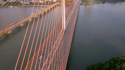 Exploring a vibrant bridge over a river in the serene afternoon Video stock 309739391