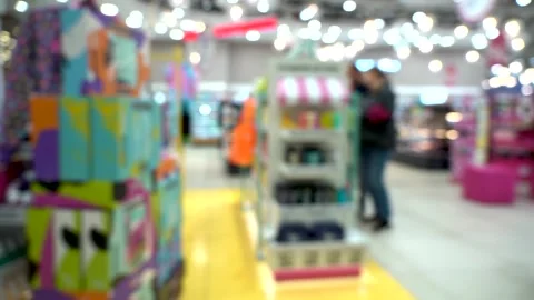 Exploring a Vibrant Retail Environment Filled with Colorful Displays and Stock Footage 321051334