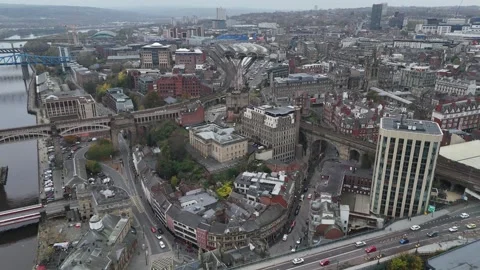 Exploring the vibrant skyline of Newcastle upon Tyne from above in autumn Stock Footage 296010645