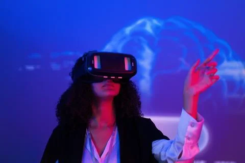 Exploring virtual reality in a futuristic setting with vibrant colors and d.. Stock Photos