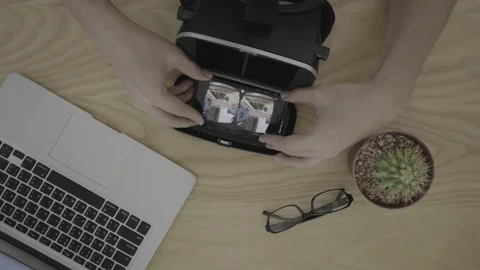 Exploring Virtual Reality with a Laptop and Headset Stock Footage 318863198