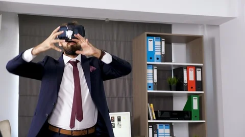 Exploring virtual reality with a VR headset Stock Footage 95232537