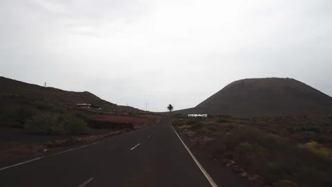 Exploring a volcanic island by car Stock Footage 318789317