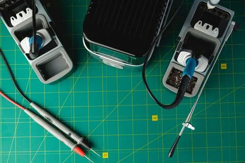 Exploring the world of electronics with tools and precision in a workshop Stock Photos