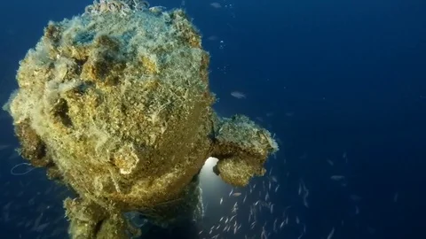 Exploring the wreck in the deep blu Stock Footage 81706129