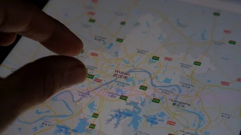 Exploring wuhan map on ipad Stock Footage 123972363