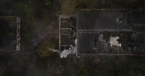 Explosion of an artillery shell from falling into an abandoned building Stock Footage 153625926